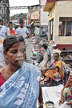 Kolkata, India â€“ September 28 2019; Street beggar is sitting on the street asking for change in the occasion of Editorial Stock Photo